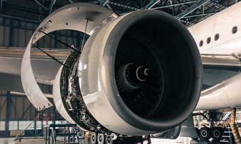 An aeroplane engine opened for maintenance