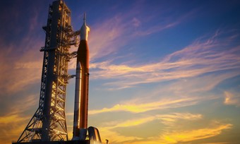 Spaceship sat upright on the launch pad ready for take-off
