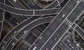 Aerial view of a complex highway intersection with multiple lines